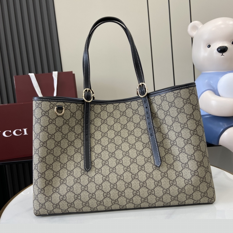 G*u*i shopping bags